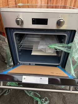 New Open box Orminge range with induction cook top stainless steel 24”w