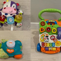 VTech Sit-to-Stand Learning Walker And Two Other Music Toys
