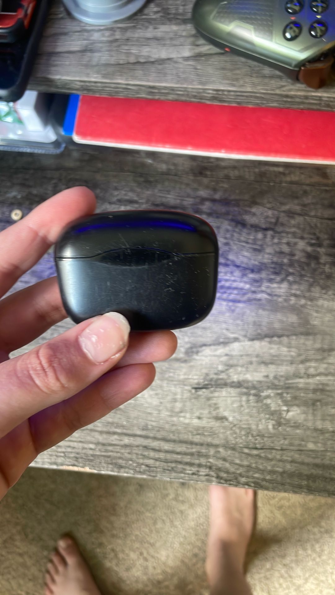 Black Earbuds Check Bio
