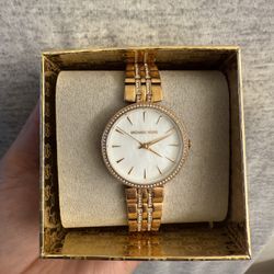 Gold Woman’s Micheal Kors Watch