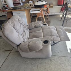 Rocker/Recliner." Over Stuffed