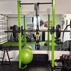 Rogue Squat Rack With Barbel And Weights