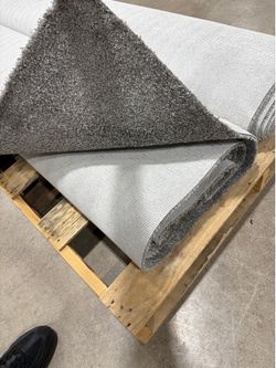 Two 10x20 silver carpets