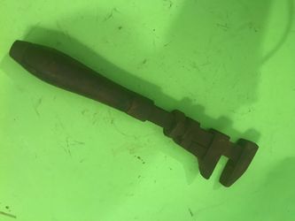 Vintage pipe wrench with wooden handle antique