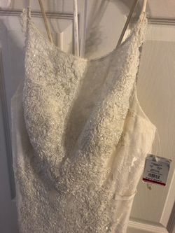 New women's white floral Size 12 wedding gown. Still Available!