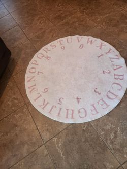 Pink alphabet rug