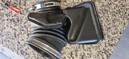 Air intake duct housing