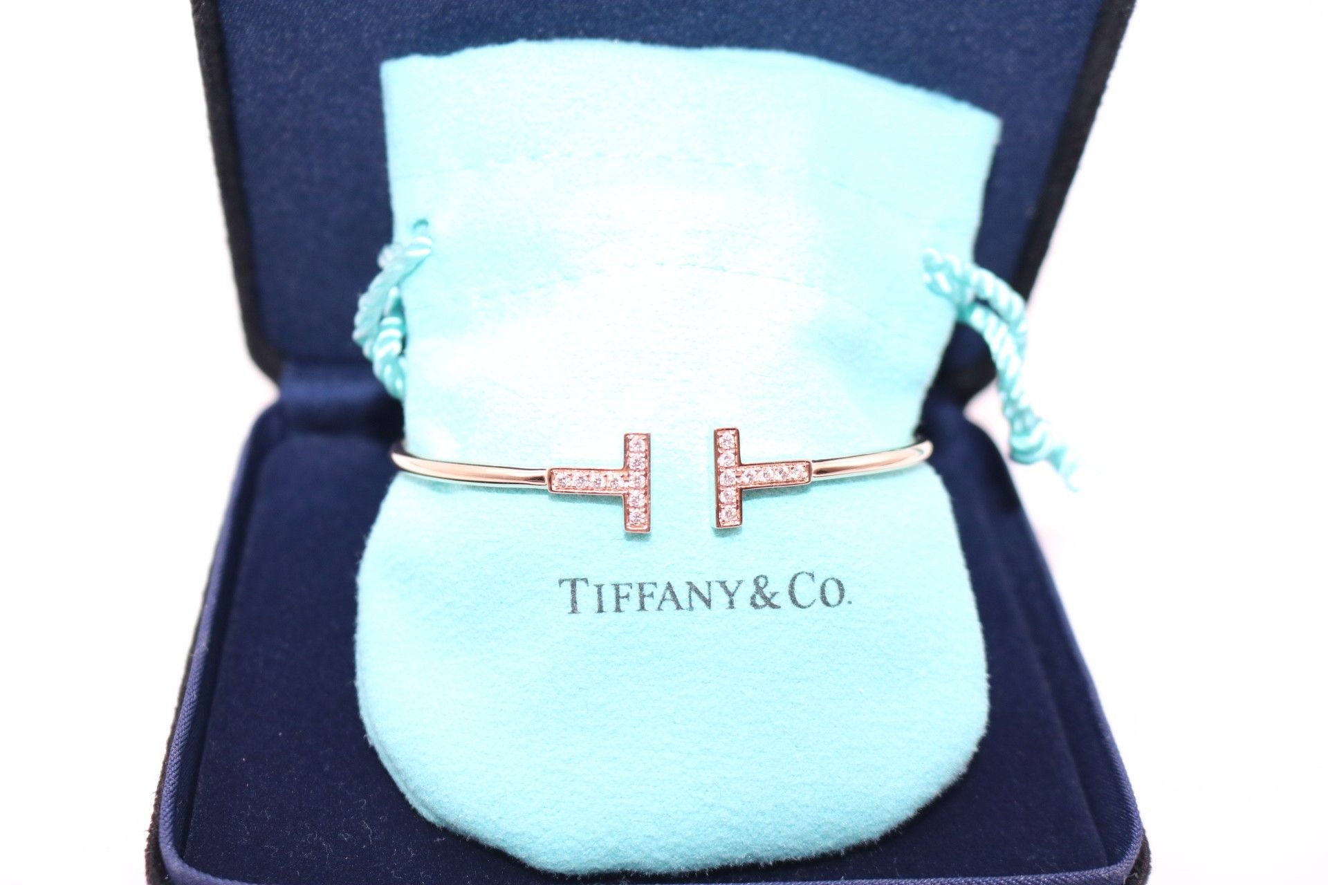 Tiffany Co T bracelet with diamonds