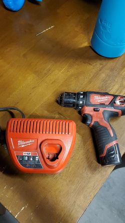 Milwaukee drill with charger and battery