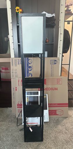 Floor lamp with shelves