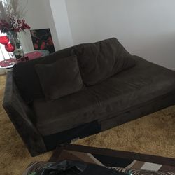 Brown Sectional With A Circle And Square Couch