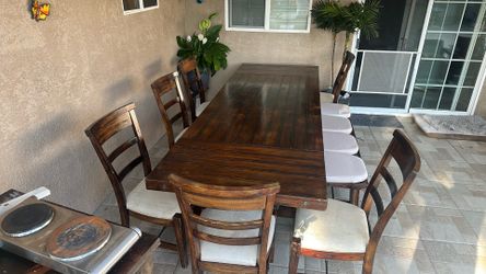 Dinning table 10 feet’s long 6 chairs and beanch solid wood
