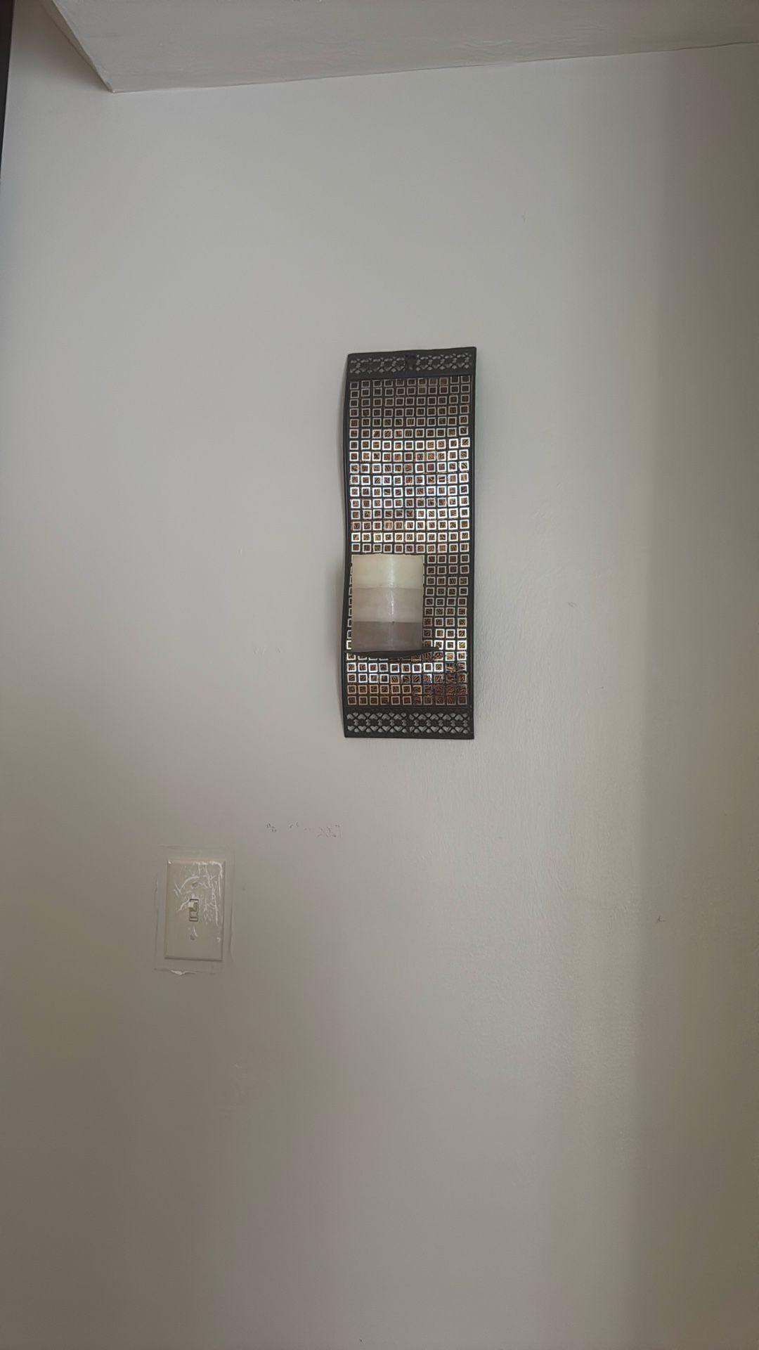 four Candle Holders With Three Pictures