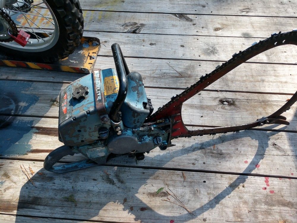 HOMELITE CHAINSAW W BOW SAW