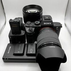 Sony Alpha A7 Mirrorless Camera Kit, Charger, Battery Grip And 2 Lenses