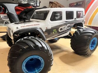 Scx24 With Monster Truck Tires And 2 Jeep Bodies