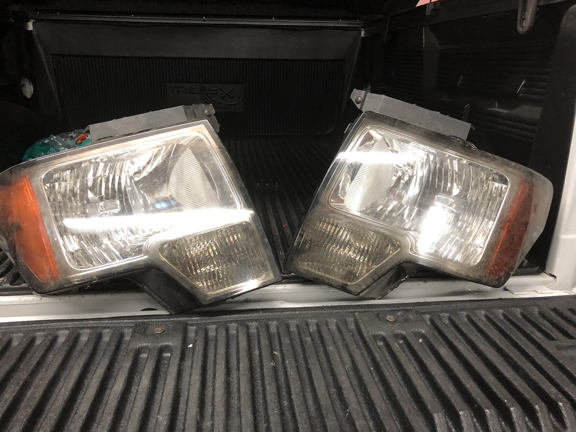 09-14 Ford F-150 front headlights OEM