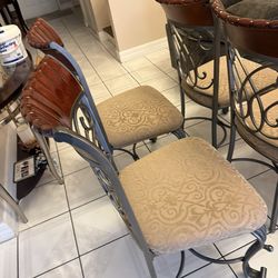 4 solid chairs