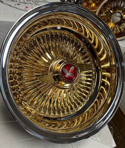 13x7 center gold wire wheels on 1558013 whitewalls Finance Available