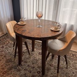 bar table and leather chairs 