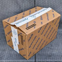 Clean medium size cardboard box with foam peanuts for shipping storage or moving