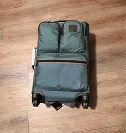 Tumi carry on luggage brand new