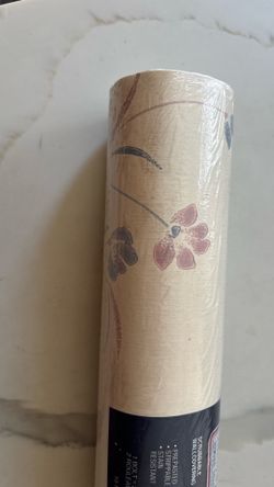 one roll wallpaper by wallcoverings  cream color flowers
