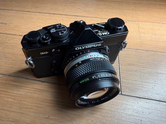 Olympus OM-2N 35mm film camera and Olympus Zuiko 50mm 1.4 lens
