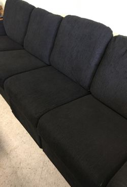 Black cloth four seater couch