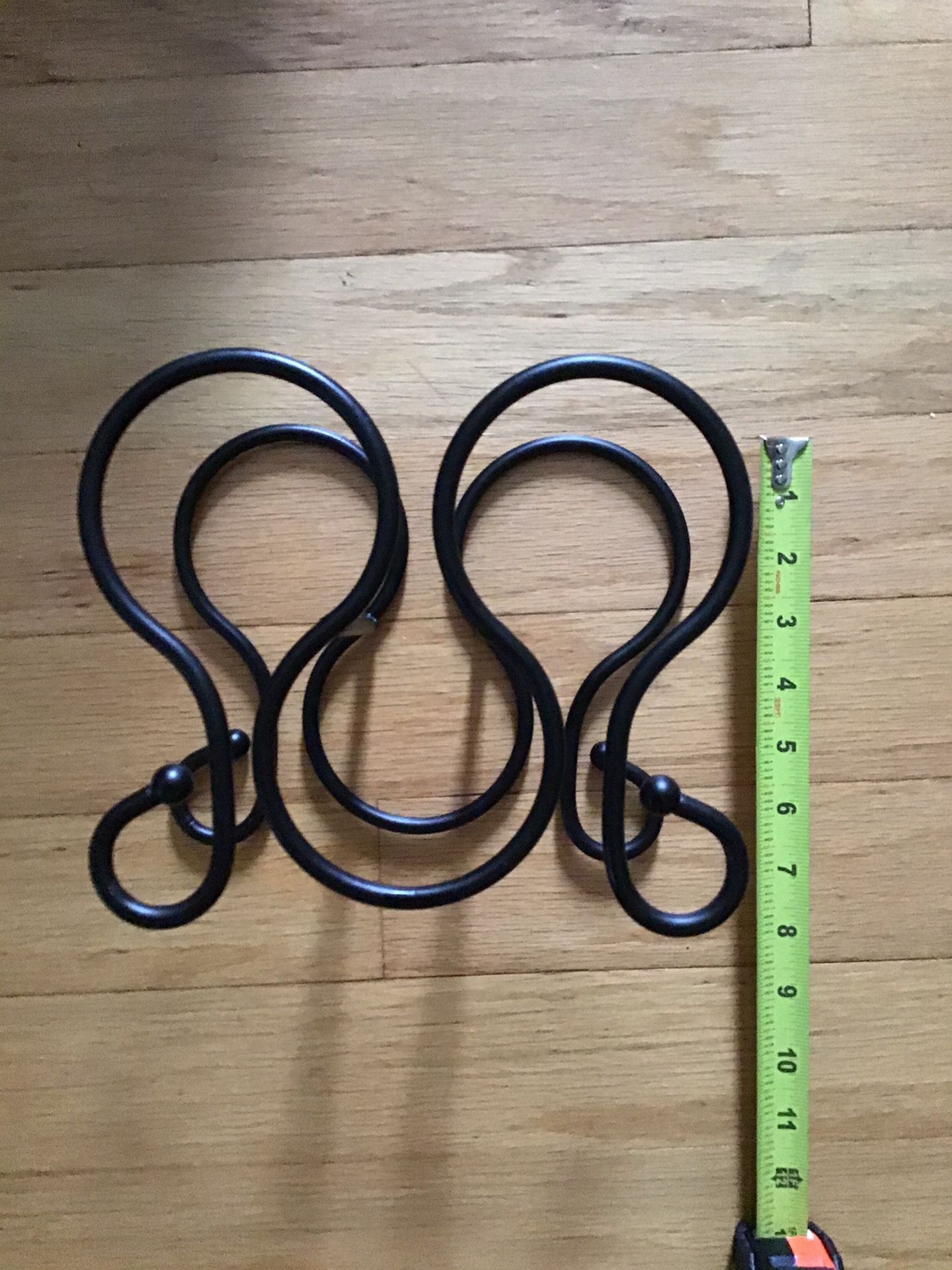 Iron wine holder for three bottles great space saver black color can easily be painted to match your decor $10