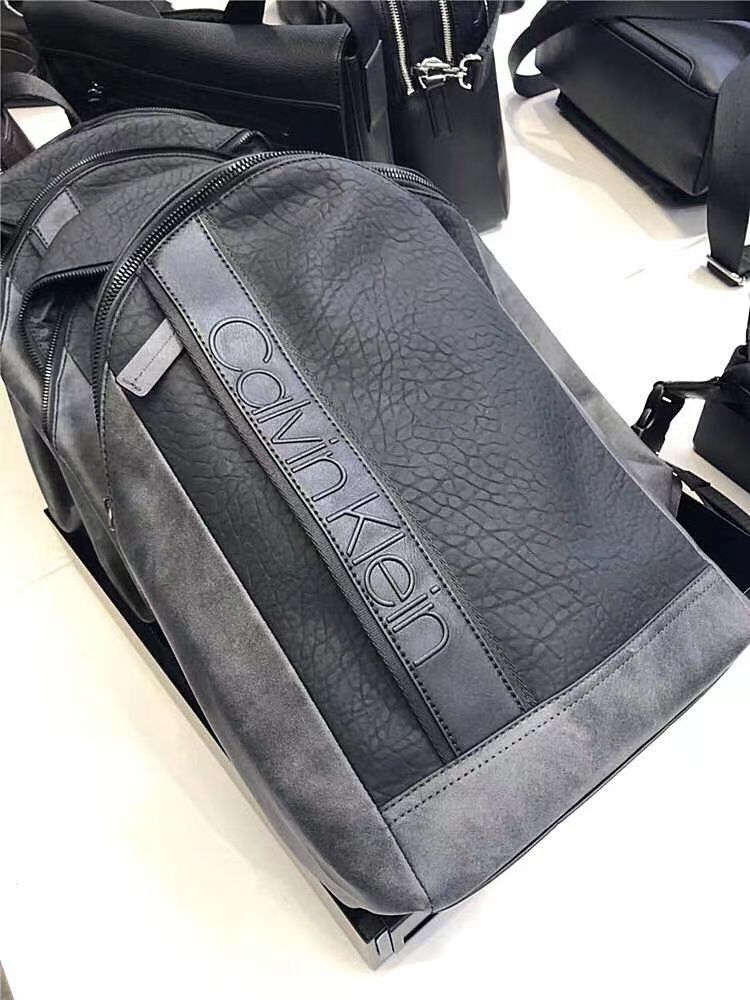 Brand new with tag Calvin Klein men's black/gray man made durable leather  sling bag  backpack Crossbody bag