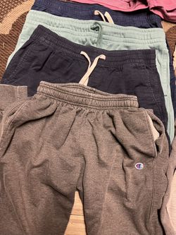 Bigger Boys Shorts And One Pair Of Pants.  4 Med And 1 Large 