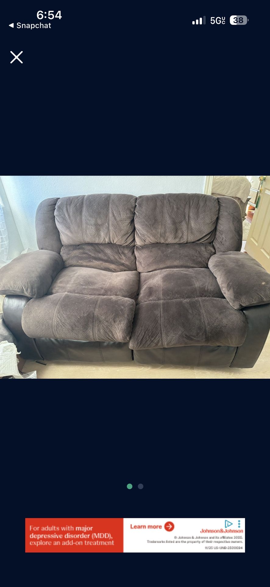 Two Seated Couch Elevated Legs