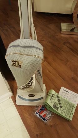 Oreck vacuum cleaner anniversary edition with extra bags and belt