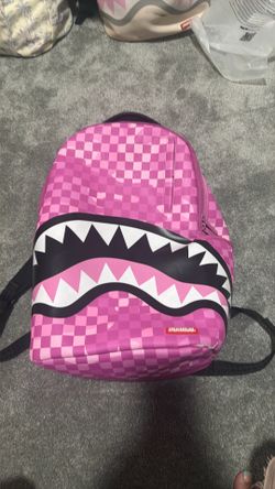 pink spray ground backpack