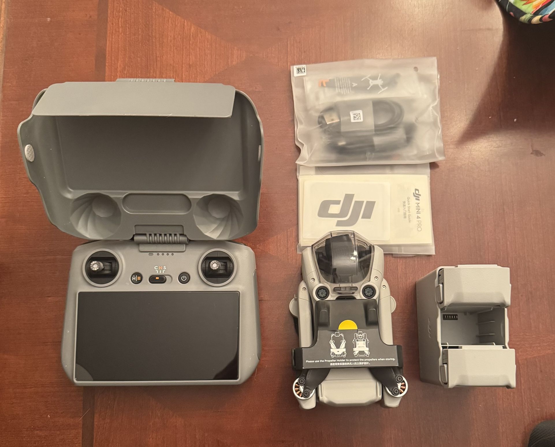 DJI MINI 4 PRO FLY MORE COMBO PLUS RC2 WITH BUILT IN SCREEN