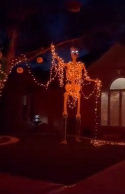 8ft Santa Claus, 12’ Skeleton used only one season