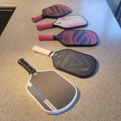 5 pickleball paddles available all like brand new $75 each firm.