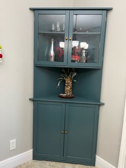 Two corner cabinets