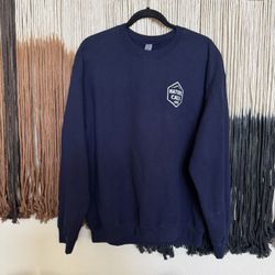 Navy blue crewneck sweatshirt with "Keepin' It Reel" graphic; perfect condition 