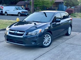 2014 Subaru Impreza 133k Clean title.