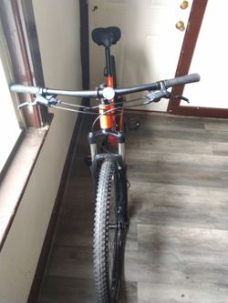 Orange Mountain Bike with Suspension Fork