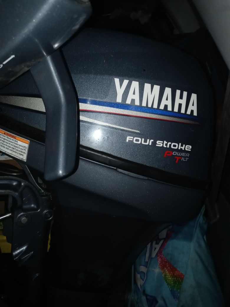 Yamaha 9.9hp long shaft 4 stroke with power tilt