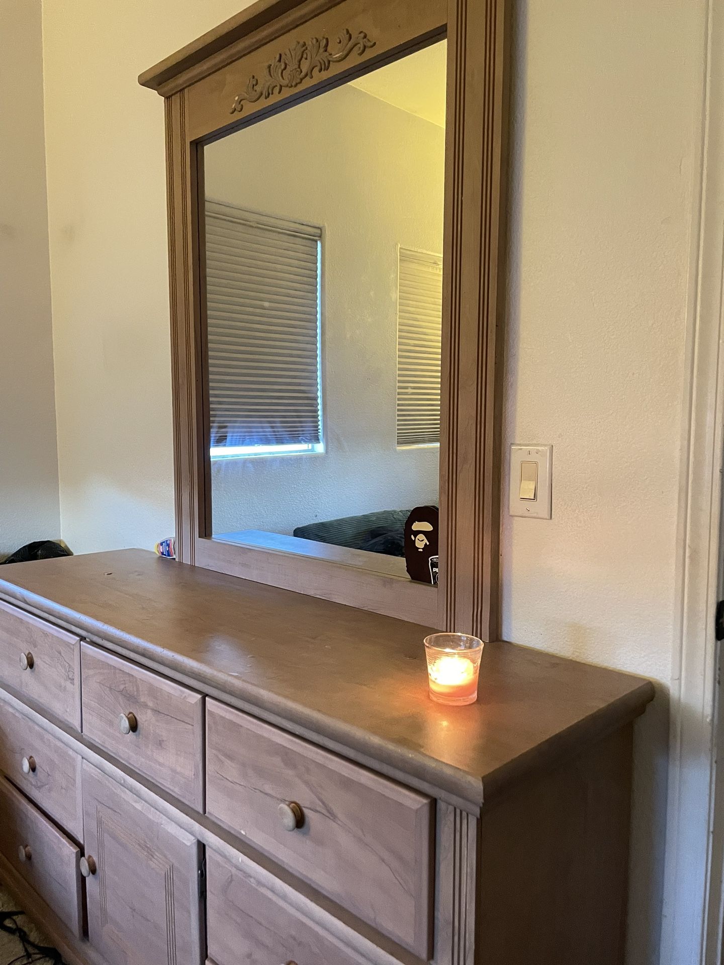 Tan dresser with mirror