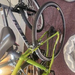 Green Shimano Specialized  8 Speed $300  And  Huffy ROCK CREEK  24   6 SPEED  $ 200 