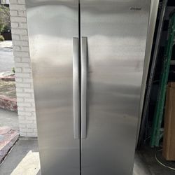 Whirlpool Fridge -Brand: Whirlpool Type: Side-by-side refrigerator - Condition: Good, used condition
