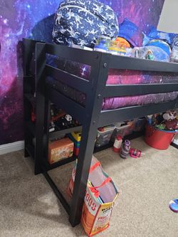 Black wooden bunk bed