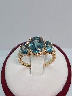 14k gold blue topaz and diamond ring