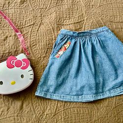 Hello Kitty girl skirt /shorts size 6 and Metal bag all for $5