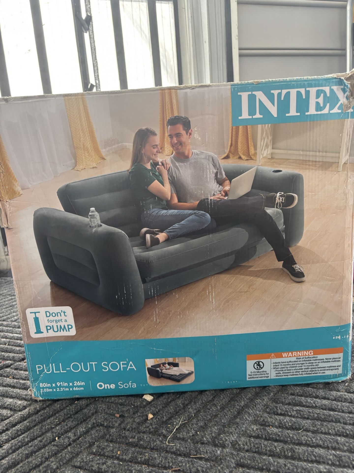 Intex Pull-Out Sofa w/ Cup Holders โ Queen Air Mattress